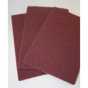 Red abrasive cleaning pads